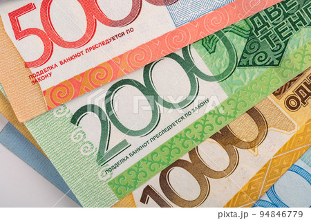 Kazakhstan money - tenge. 500, 1000, 2000, 5000, 10000 banknotes. Close up of tenge on white background. 94846779