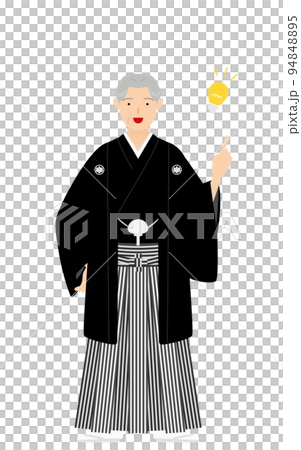 Senior man with a crested hakama (in Japanese clothes) points and gives advice 94848895