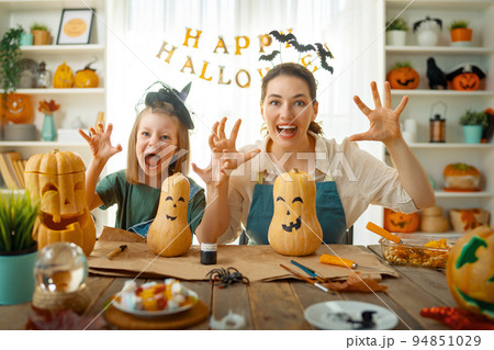 family preparing for Halloween 94851029