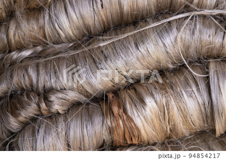 A thick bundle of Golden jute fiber Texture Background A thick bundle of Golden jute fiber Texture Background 94854217