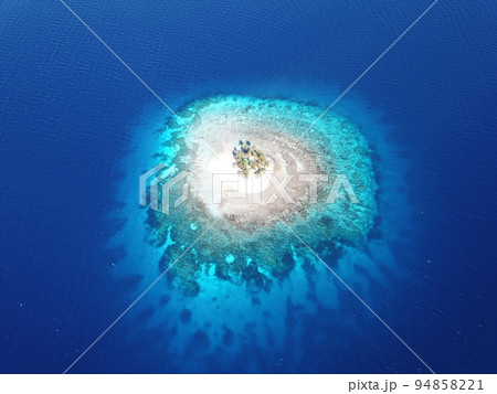 Uninhabited island JEEP island in Chuuk, Micronesia. Here is the world's greatest wreck diving destination. Uninhabited island JEEP island in Chuuk, Micronesia. Here is the world's greatest wreck diving destination. 94858221