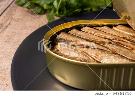 Canned fish - smoked sprats in oil. Conserve from herring, sprats and other small fish. 94861716
