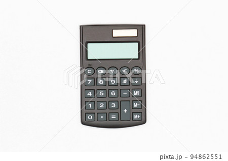 Calculator with big buttons with empty digital screen on a white background. Isolated. Solar powered financial calculator. Electronic machine for math calculations. Business office supplies. Close-Up Calculator with big buttons with empty digital screen on a white background. Isolated. Solar powered financial calculator. Electronic machine for math calculations. Business office supplies. Close-Up 94862551