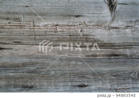 Wooden board. Old texture. Dark background. Aged grunge fence gray surface with scratches and cracks copy space for text logo. Wooden board. Old texture. Dark background. Aged grunge fence gray surface with scratches and cracks copy space for text logo. 94863548