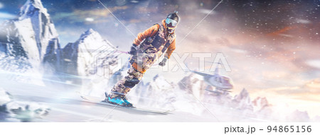 Heli skiing action. Sport emotion. Motion of the skiing downhill in the mountains. Professional skiing in action. Flying helicopter Heli skiing action. Sport emotion. Motion of the skiing downhill in the mountains. Professional skiing in action. Flying helicopter 94865156