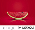 sliced watermelon put on a red background  94865928