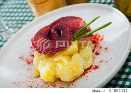 Tentacle of octopus with potatoes Tentacle of octopus with potatoes 94866431