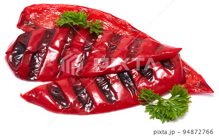Grilled Slices of red pepper with stripes from a grill isolated on white background Grilled Slices of red pepper with stripes from a grill isolated on white background 94872766