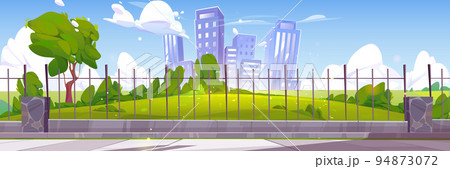 City park and buildings behind metal fence City park and buildings behind metal fence 94873072