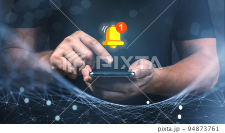 Man holding cellphone and touching with virtual bell for E-mail with notification alert, Contact us or Customer support hotline people, connection and communication 94873761