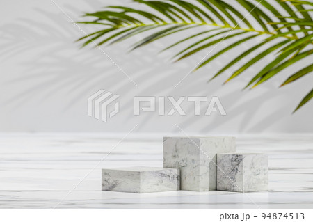 Product display stand with wooden cube under palm leaf. Pedestal for cosmetic product and packaging mockups display presentation. Summer modern showcase with cube marble podium Product display stand with wooden cube under palm leaf. Pedestal for cosmetic product and packaging mockups display presentation. Summer modern showcase with cube marble podium 94874513