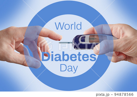 Taking a blood sample to measure glucose levels against the background of a blue ring, a symbol of world diabetes day 94878566