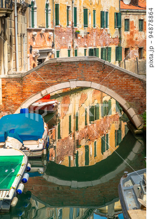 Peaceful Canal scenary in romantic Venice at springtime, Italy Peaceful Canal scenary in romantic Venice at springtime, Italy 94878864