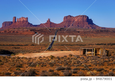 Highway Road U.S. Highway 163 and Monument Valley at sunset, Arizona, USA Highway Road U.S. Highway 163 and Monument Valley at sunset, Arizona, USA 94879001