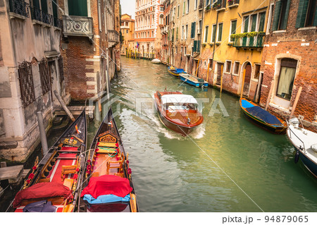 Peaceful Canal scenary in romantic Venice at springtime, Italy Peaceful Canal scenary in romantic Venice at springtime, Italy 94879065