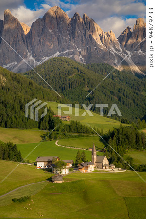 St. Magdalena with famous church in Val di Funes at sunset, Dolomites , Italy 94879233