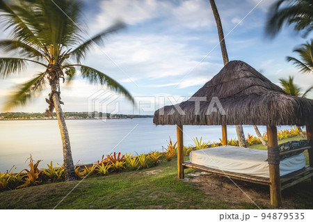 Porto Seguro Beach with tropical tregarden e and gazebo palapa in BAHIA, Brazil Porto Seguro Beach with tropical tregarden e and gazebo palapa in BAHIA, Brazil 94879535