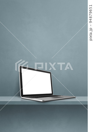 Laptop computer on grey shelf. Vertical background 94879651
