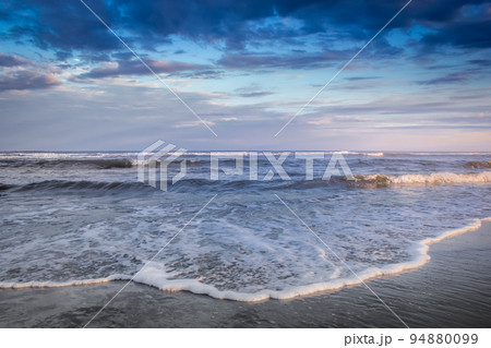 Beach in Torres city, Rio Grande do Sul state at sunset, Southern Brazil Beach in Torres city, Rio Grande do Sul state at sunset, Southern Brazil 94880099