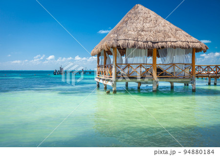 Cancun idyllic caribbean beach and gazebo Palapa, Riviera Maya, Mexico 94880184