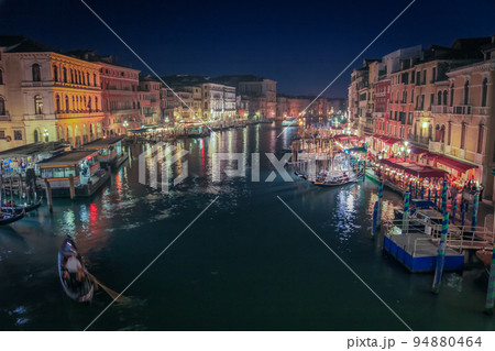 Ornate Gondolas in Grand Canal at illuminated night, Venice, Italy 94880464