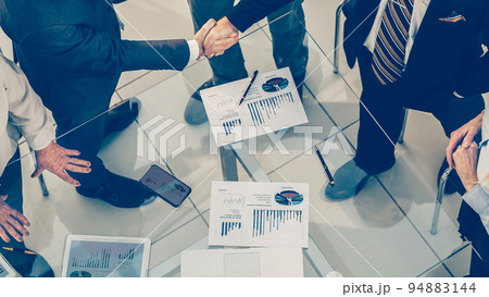 top view. business people greeting each other before the meeting. 94883144
