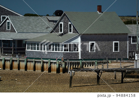panorama of Sandy Neck Lighthouse atlantic ocean cape cod barnstable houses taken from the sea 94884158