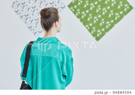 Girl in Art Gallery Back View Girl in Art Gallery Back View 94884504