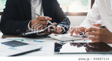 Business people meeting and planning business strategies together in the office. Financial advisor and accounting concept 94887114
