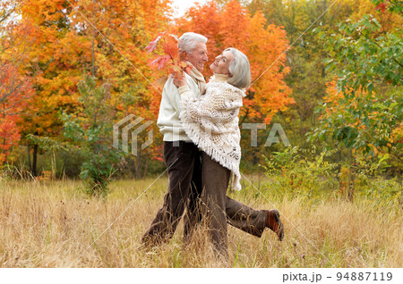Elderly couple dance in autumn. Full length  94887119