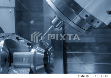 The multi-tasking CNC machine  cutting the differential gear part. 94894918