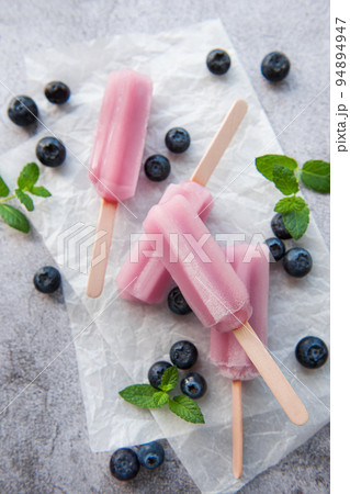 Homemade blueberry ice cream or popsicles 94894947
