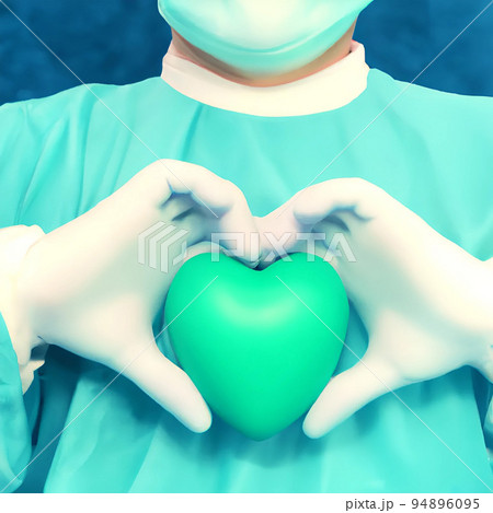 Surgeon holding a green hearth Surgeon holding a green hearth 94896095
