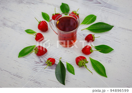 Fresh organic strawberries , over dark background Fresh organic strawberries , over dark background 94896599