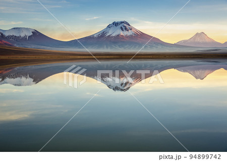 Idyllic Lake Lejia reflection and volcanic landscape in Atacama desert, Chile 94899742
