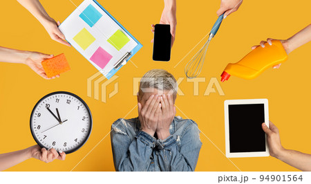 Overwhelmed mature woman having difficulties with time management Overwhelmed mature woman having difficulties with time management 94901564