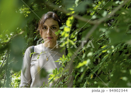 young woman descending in the ravine, vegetation and trees, huentitan ravine guadalajara, mexico young woman descending in the ravine, vegetation and trees, huentitan ravine guadalajara, mexico 94902344