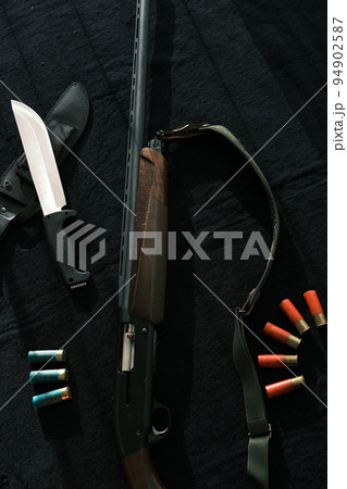 Weapon on black cloth Weapon on black cloth 94902587