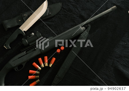 Weapon on black cloth Weapon on black cloth 94902637