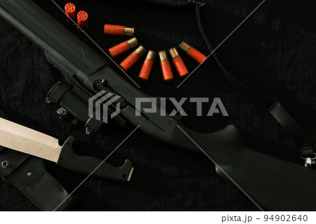 Weapon on black cloth 94902640