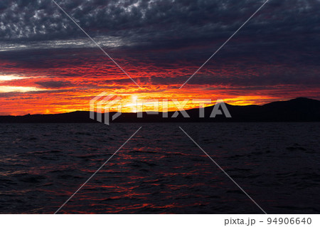Colorful ocean beach sunrise. Colorful ocean beach sunrise. 94906640