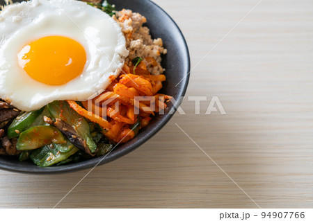 Korean spicy salad with rice - traditionally Korean food, Bibimbap Korean spicy salad with rice - traditionally Korean food, Bibimbap 94907766