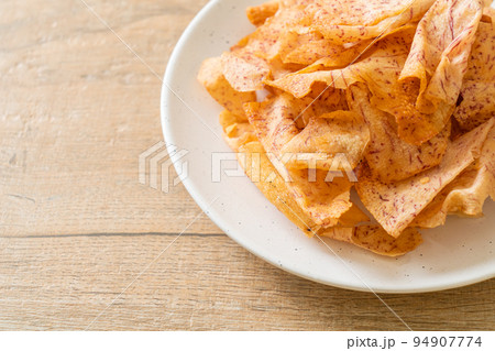 Taro Chips - fried or baked sliced taro Taro Chips - fried or baked sliced taro 94907774