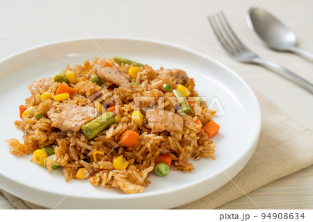 pork fried rice on white plate pork fried rice on white plate 94908634