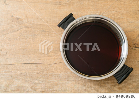 black soup in hot pot for shabu or sukiyaki 94909886