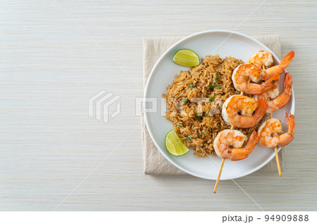 fried rice with shrimps skewers 94909888