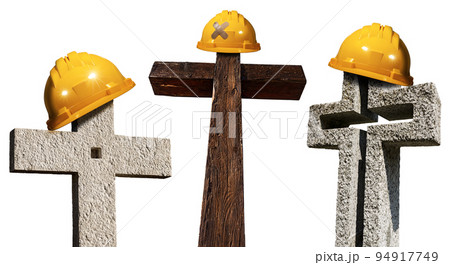 Orange Hard Hat or Safety Helmet on a Stone or Wooden Cross Orange Hard Hat or Safety Helmet on a Stone or Wooden Cross 94917749