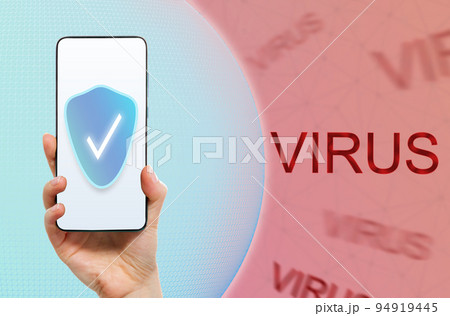 Hand holding smartphone on a light blue sphere. Red background with internet viruses. Antivirus protection. Cyber defense concept and phone apps Hand holding smartphone on a light blue sphere. Red background with internet viruses. Antivirus protection. Cyber defense concept and phone apps 94919445