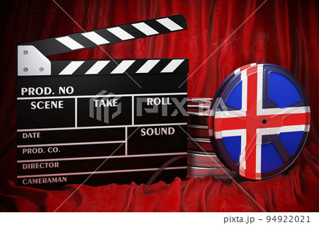 Icelandic cinematography, film industry, cinema in Iceland. Clapperboard with and film reels on the red fabric, 3D rendering 94922021
