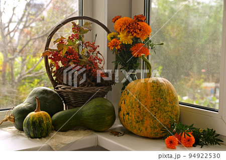 Vintage still life with pumpkins and decorations on the window ceiling inside, thanksgiving day background, fall calendar season concept 94922530